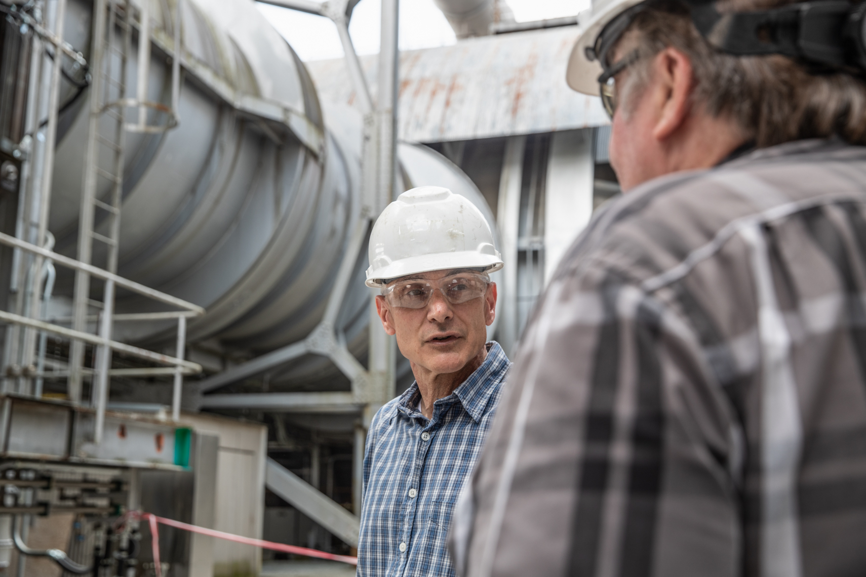 Engineering leadership discussion at an industrial facility