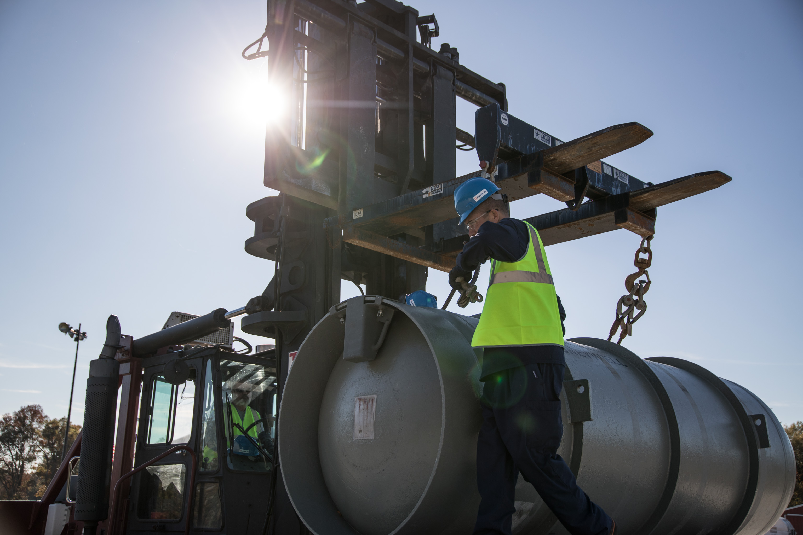 Precision cask handling for a nuclear fuel cycle client