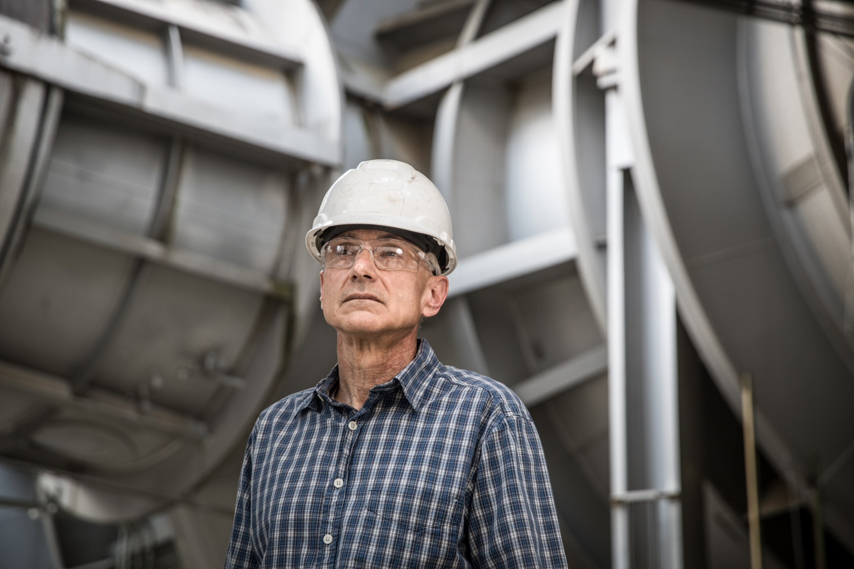 Engineering leadership portrait at an industrial facility