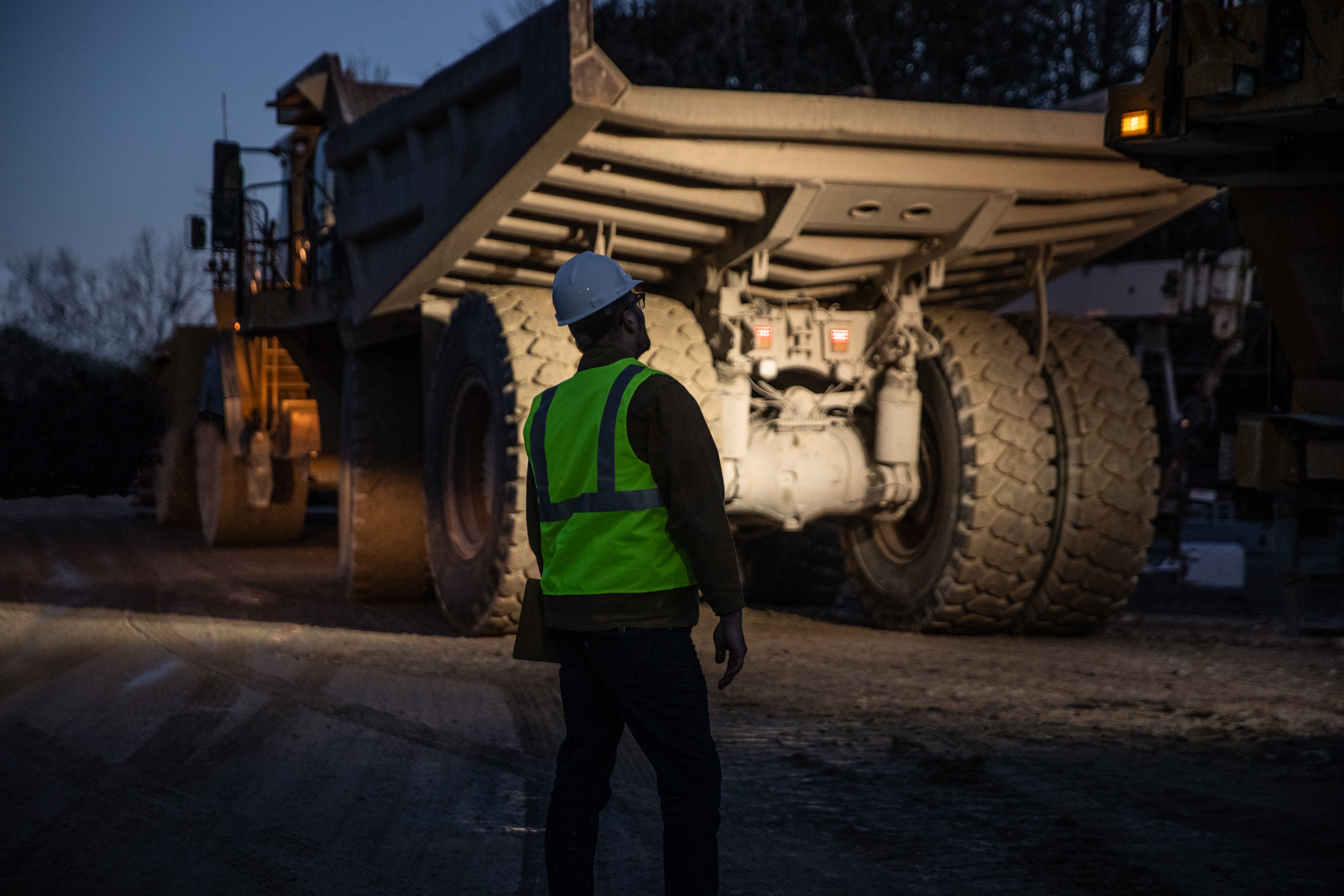 Mining haul truck and heavy equipment on an active mine site