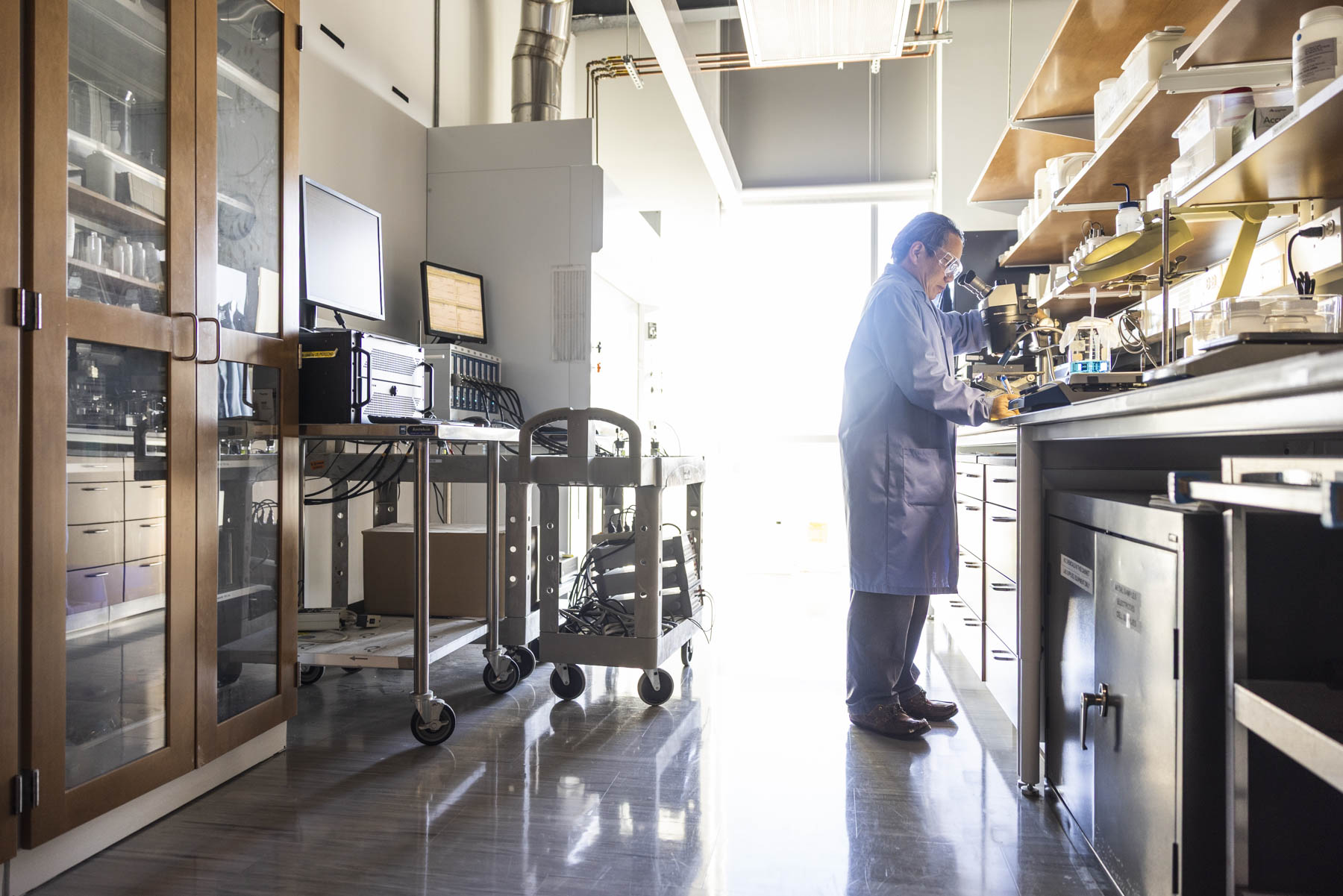 Materials engineer working in an aerospace corrosion testing laboratory